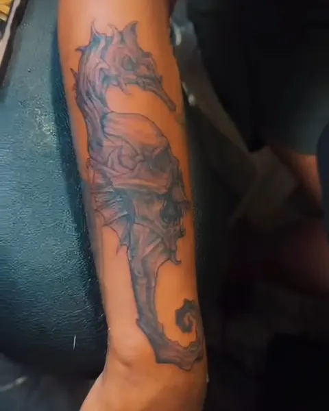 Color forearm tattoo of a sea creature